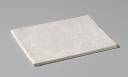 Linen damask napkin with a floral pattern