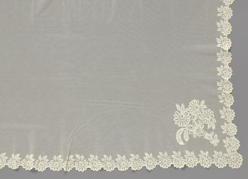 Bridal veil of lace embroidery on tulle with scalloped edge and rosette flowers