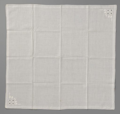 Linen handkerchief, decorated along the edge with woven stripes, and in two corners with white work in the form of flowers and leaves