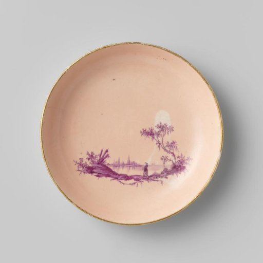 Saucer from a coffee and tea service, painted with figures in a river landscape in beetroot red