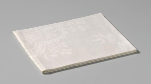 Linen damask napkin with a floral pattern