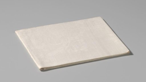 Linen damask napkin with a floral pattern
