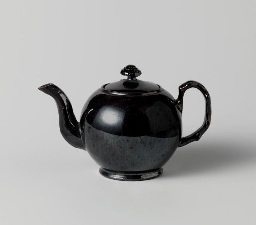 Lid of earthenware with black-glaze.