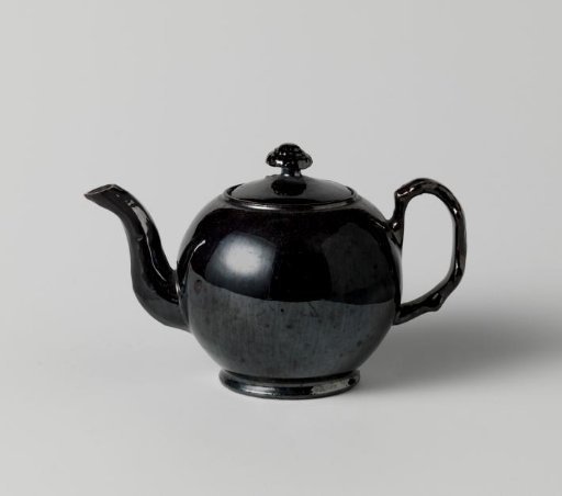 Teapot with lid of earthenware with black-glazed finish.