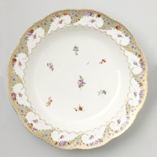 Plate, painted with volute-shaped compartments and wildflowers