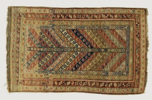 Carpet, so-called striped carpet. In the central field V-shaped stripes with flowers and a vertical stripe with checks. Fourfold border with floral scrolls.