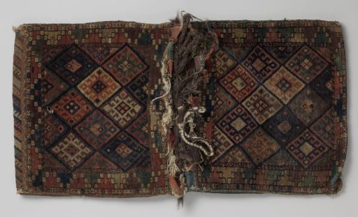 Saddlebag, double, decorated with lattice work containing hooked-cross flowers