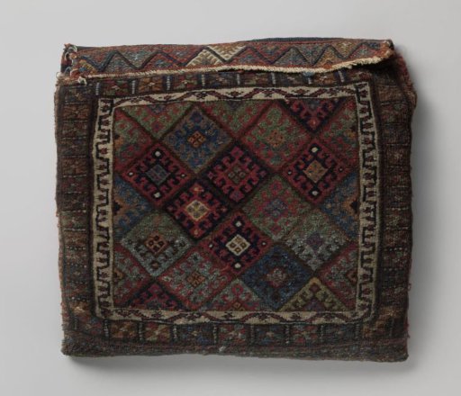 Saddlebag, decorated with brown lattice and hooked cross flowers