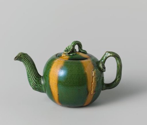 Teapot of hard-baked earthenware.