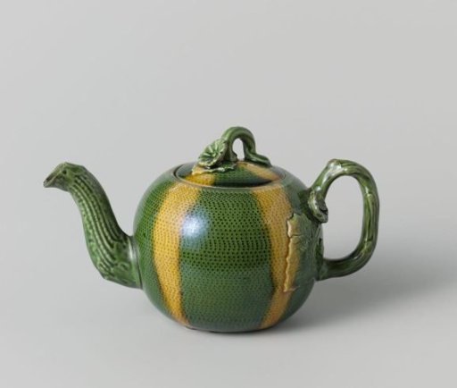 Teapot of hard-fired earthenware.