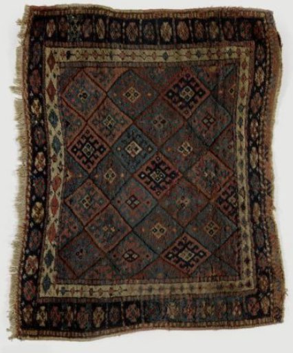 Cover of a saddlebag, decorated with a grid pattern
