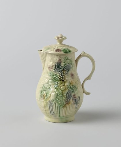 Milk jug of hard-fired earthenware.