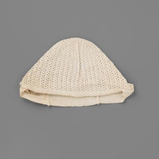 Knitted Cotton Cap, with a Strip of Finer Structure Along the Forehead