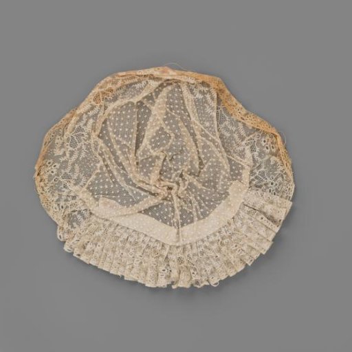Tulle Hat with Lace from Rijs; the Crown of Tulle Embroidered with Motifs is Trimmed Along the Forehead with a Strip of Lace from Rijs