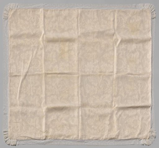 Baptismal cloth of damask with pomegranate motif and bobbin lace border