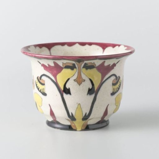 Earthenware bowl decorated with stylized floral motifs