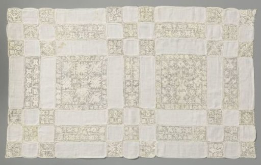 Cloth of squares and rectangles alternating linen and lace embroidery with cutwork