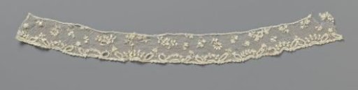 Strip of needle lace with a floral spray pattern and small pointed oval motifs
