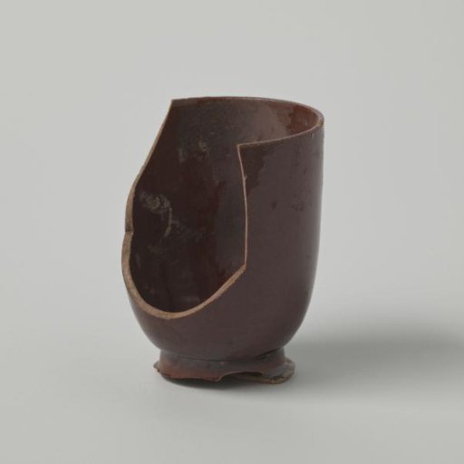 High head with a reddish-brown glaze (De Caluwe kiln waste)