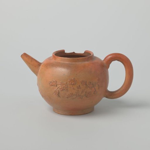 Teapot with flower branches in relief (De Caluwe kiln waste)