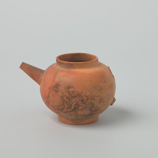 Teapot with floral scrolls in relief (De Caluwe kiln waste)
