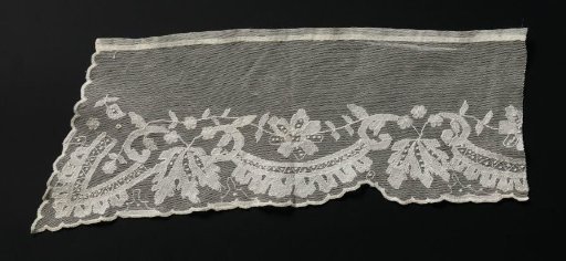 Part of a collar of lace embroidery on machine-made tulle