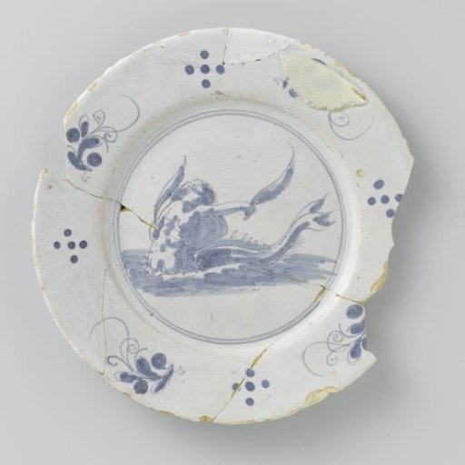 Fragmentary plate painted in blue with a sea god