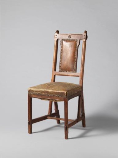 Chair with brown leather upholstery