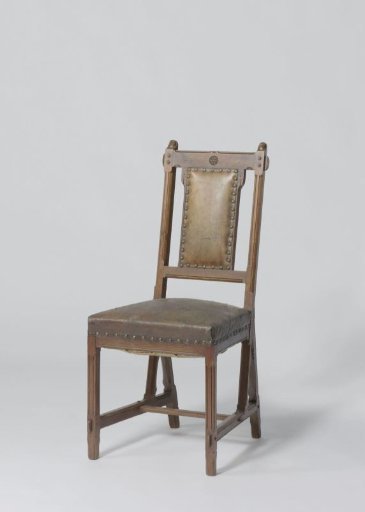 Chair with brown leather upholstery