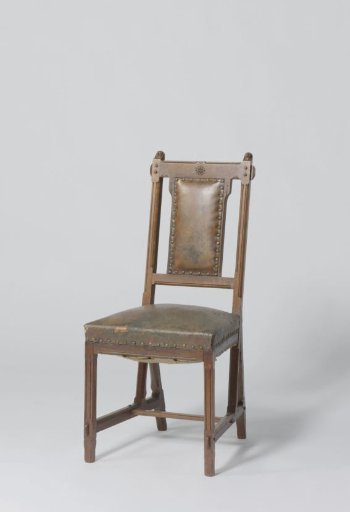 Chair with brown leather upholstery
