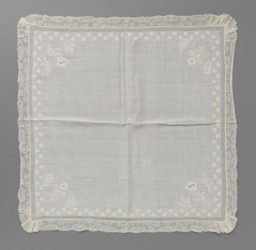 Batiste handkerchief with three flower sprigs in each corner made in shadow work and a border of Flemish lace