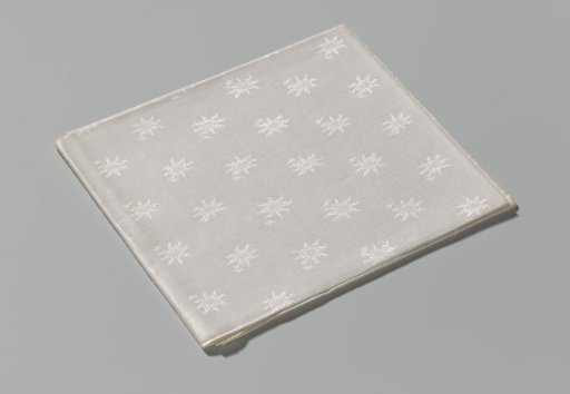 Linen damask napkin with a floral pattern