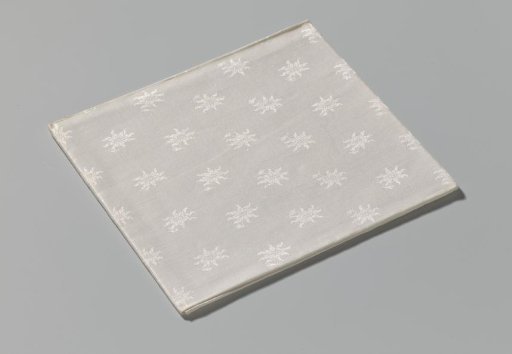Linen damask napkin with a floral pattern