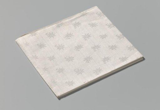 Linen damask napkin with a floral pattern