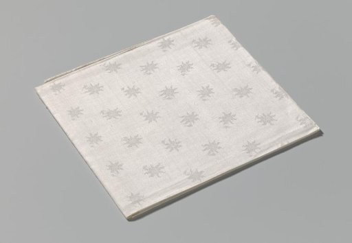 Linen damask napkin with a floral pattern