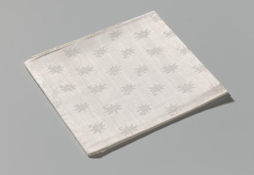 Linen damask napkin with a floral pattern