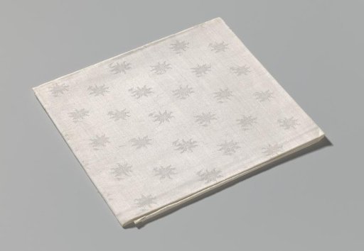 Linen damask napkin with a floral pattern