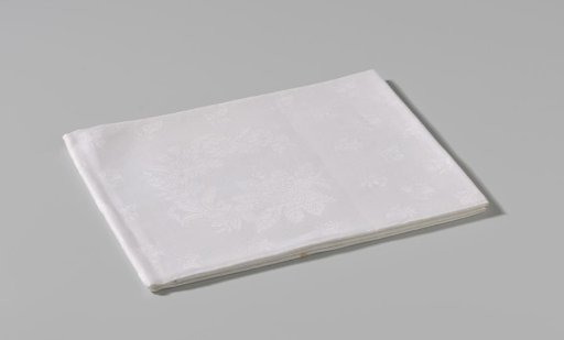 Linen damask napkin with a floral pattern