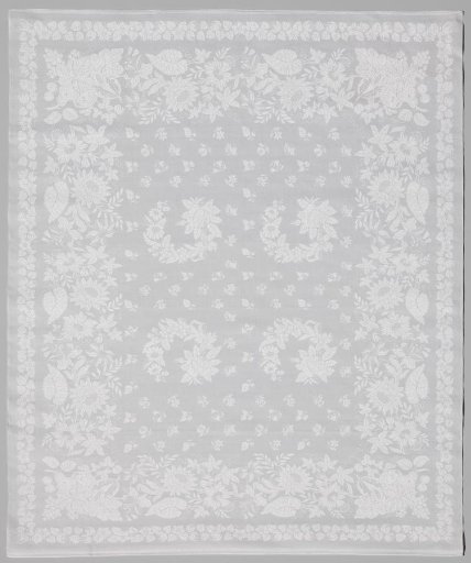Linen damask napkin with a floral pattern