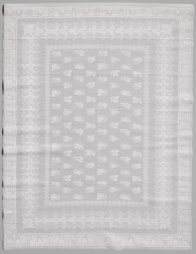 Linen damask napkin with a floral pattern