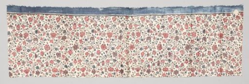 Fragment of a chair with a pattern of twigs with small flowers