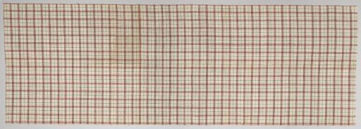 Fragment of drying cloths with green checks