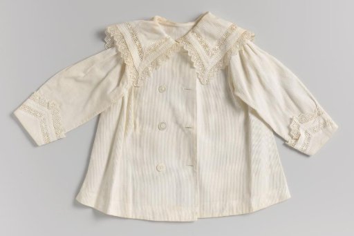 Jacket of white twill cotton with machine-made lace inserts in the collar and cuffs