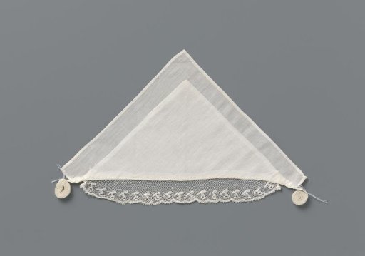 Linen tablecloth with a strip of Mechlin lace, with wavy edge and open berries on a branch