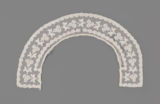 Round collar of tulle with white work (plumetis) in the form of leaves and flowers