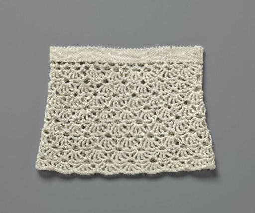 Cuff of crochet work with fan motif