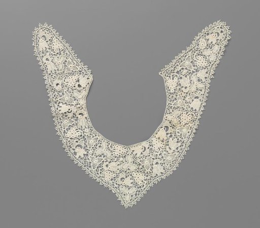 Shawl collar of crocheted lace with grape clusters and three-petaled flowers