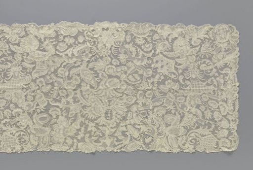 Border strip of needle lace with horns of plenty