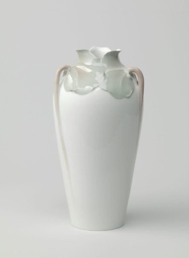 Vase with three pink branches with foliage