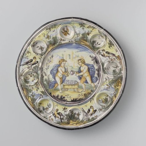 Serving tray on legs, painted with naked boys at a table in a landscape